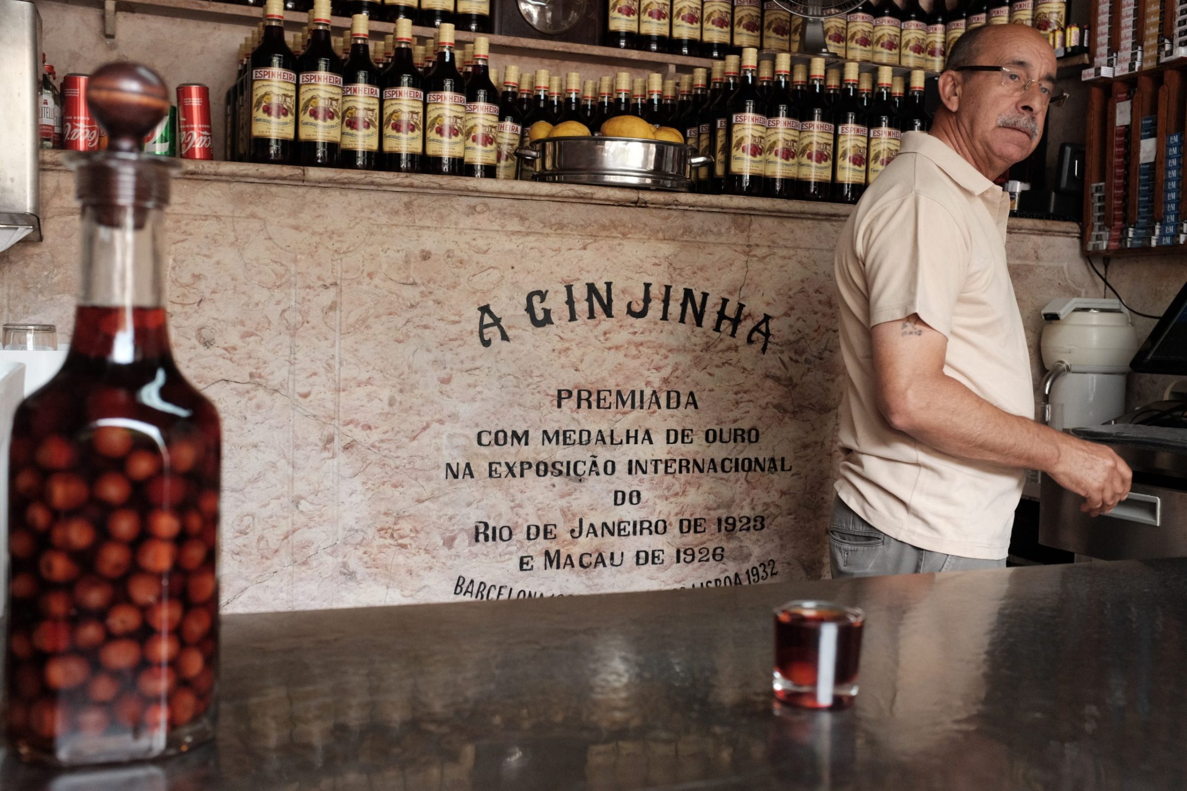 The A Ginjinha bar in Lisbon with a bottle of cherry liqueur on the counter