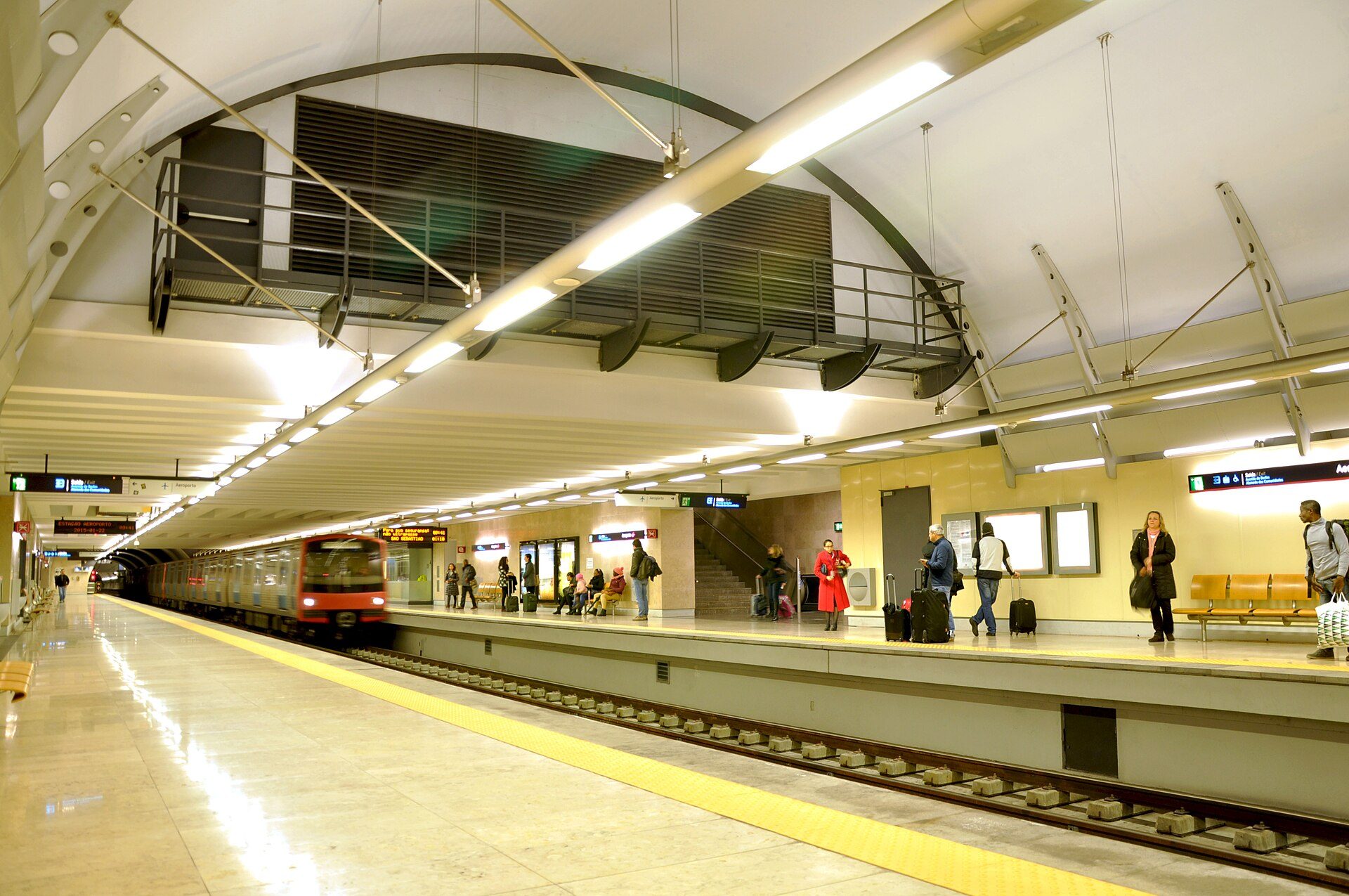 A Red Line train arriving at Aeroporto metro station in Lisbon